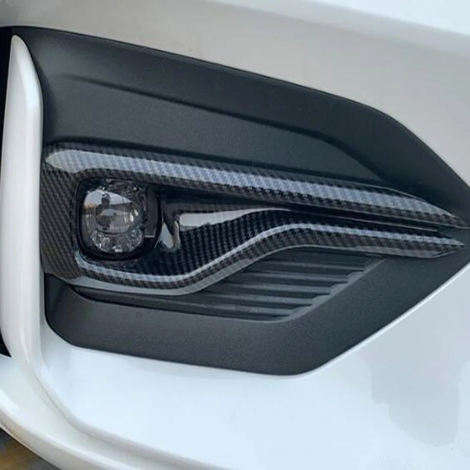 Focus MK3 & 3.5 Fog Light Surrounds, Gloss Black or Carbon Fiber Effect